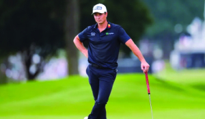Hovland surges to 1-shot lead with cast of challengers lined up behind him