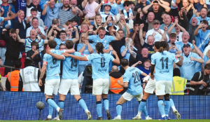 Man City books another FA Cup final and Arsenal goes top of the Premier League