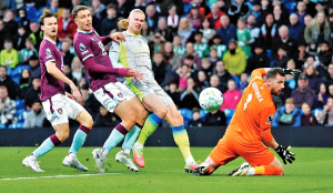 Man City tops Premier League as Haaland’s winner relegates Burnley