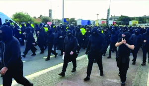 Masked men block Dover port traffic in anti-immigrant protest