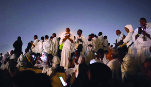Muslim pilgrims converge on Arafat for prayers as Haj reaches its peak