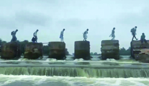 NHRC notice to MP Govt over kids crossing check dam to reach school