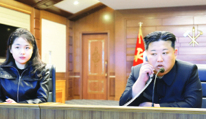 North Korean leader Kim watches cruise missile tests with daughter