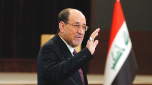 Nouri Al-Maliki is defiant after Trump threatens