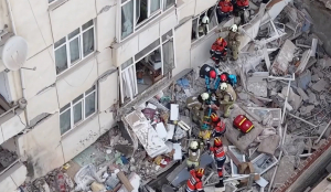 One killed, three feared trapped after Istanbul building partially collapses