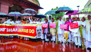 Opposition MPs protest in rain over alleged Ram temple donation theft, police excesses
