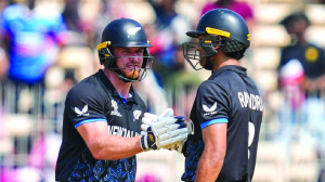 Phillips, Rachin fifties power NZ into Super-8 with win over Canada