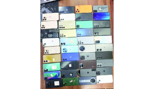 Police bust cross-border gang, seize 163 stolen phones
