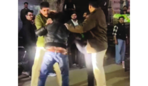 Police save stunt biker from angry crowd