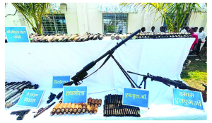 Police seize `1 crore cash, arms from Maoist dumps