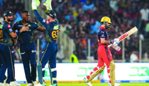 Rabada, Holder sparkle as GT bowl out RCB