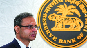 RBI keeps rates steady; markets, rupee gain