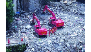 Rescuers in China search rubble for survivors of landslide that killed eight, left 34 missing