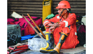Rescuers race against time at hostel collapse
