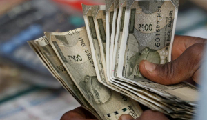 Rupee gains 3 paise against dollar, closes at 95.42