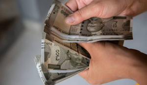 Rupee gains 48 Paise to close at 94.95 against US Dollar