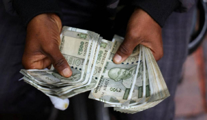 Rupee jumps 77 Paise to close at 95.08 against US Dollar