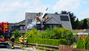 Small plane crashes into German home, 1 dead, 1 missing