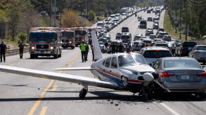 Small plane makes emergency landing on busy US road