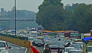 Steady rain, VIP-related curbs bring city traffic to standstill