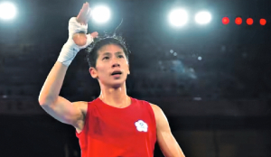 Taiwan boxing champ wins first bout at Asian titles