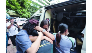 Thai high school shooting death toll rises to 8 after girl dies