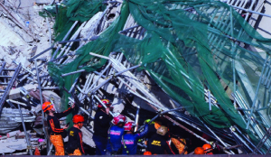 Three saved, four dead in Philippine hotel collapse