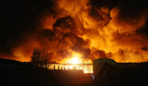 Ukrainian drone strikes kill seven warehouse workers, trigger fire at oil depot in Russia