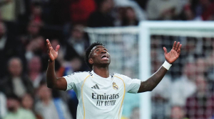 Vinicius helps Real Madrid advance into round of 16 of Champions League