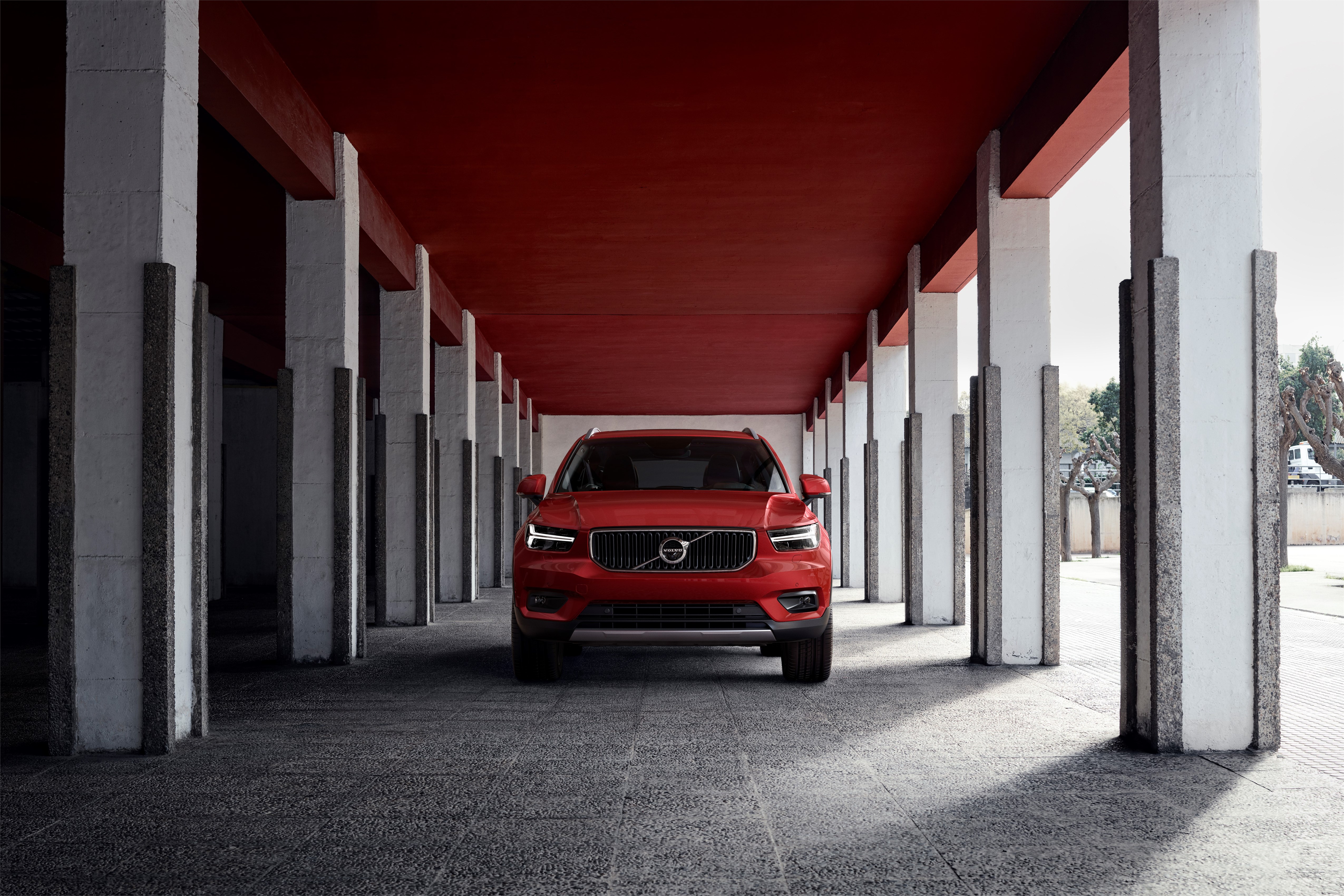 New Volvo XC40 Momentum in Fusion Red - exterior, on location