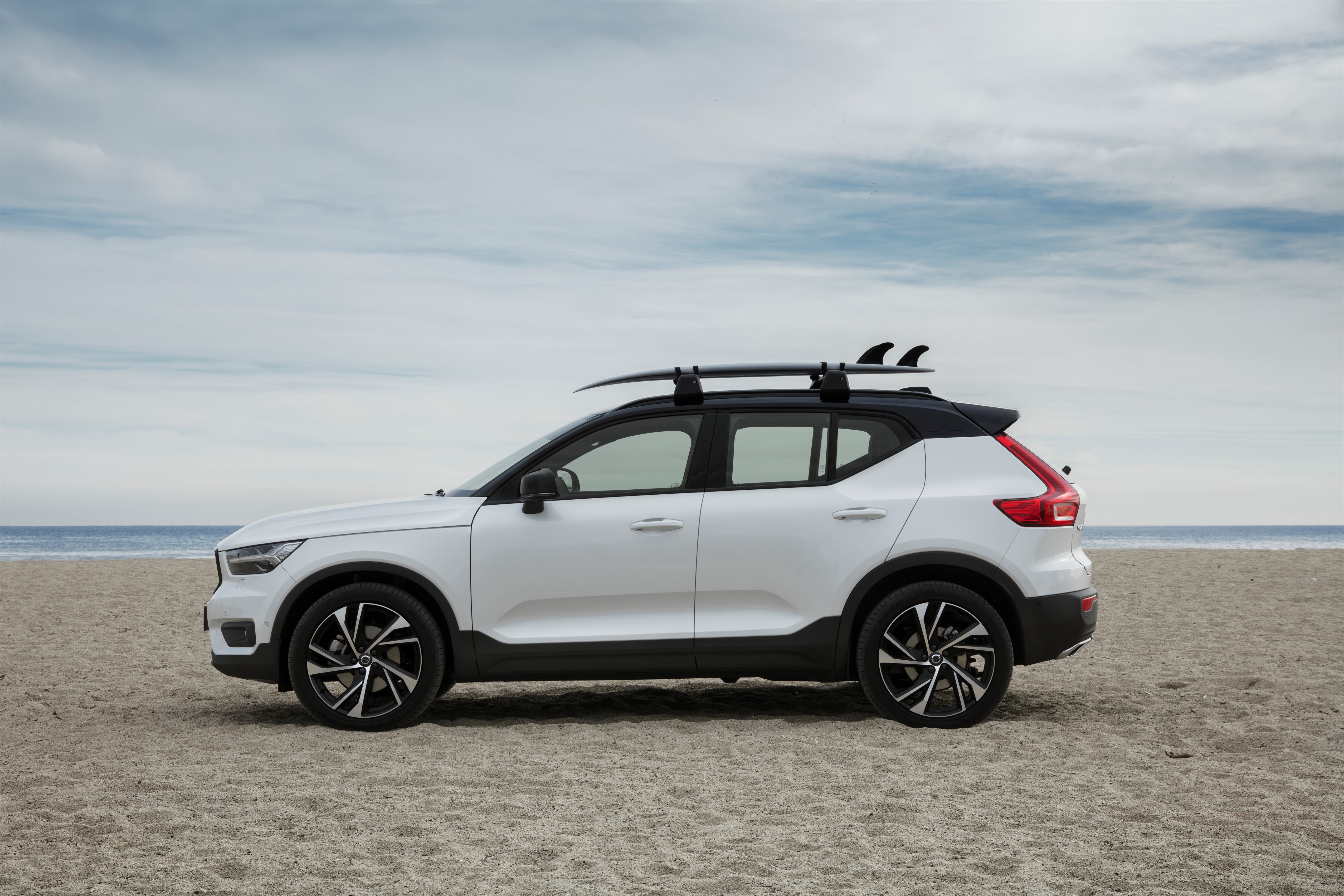 New Volvo XC40 R-Design T5 Crystal White with black roof on location in Barcelona, HAV surfboards