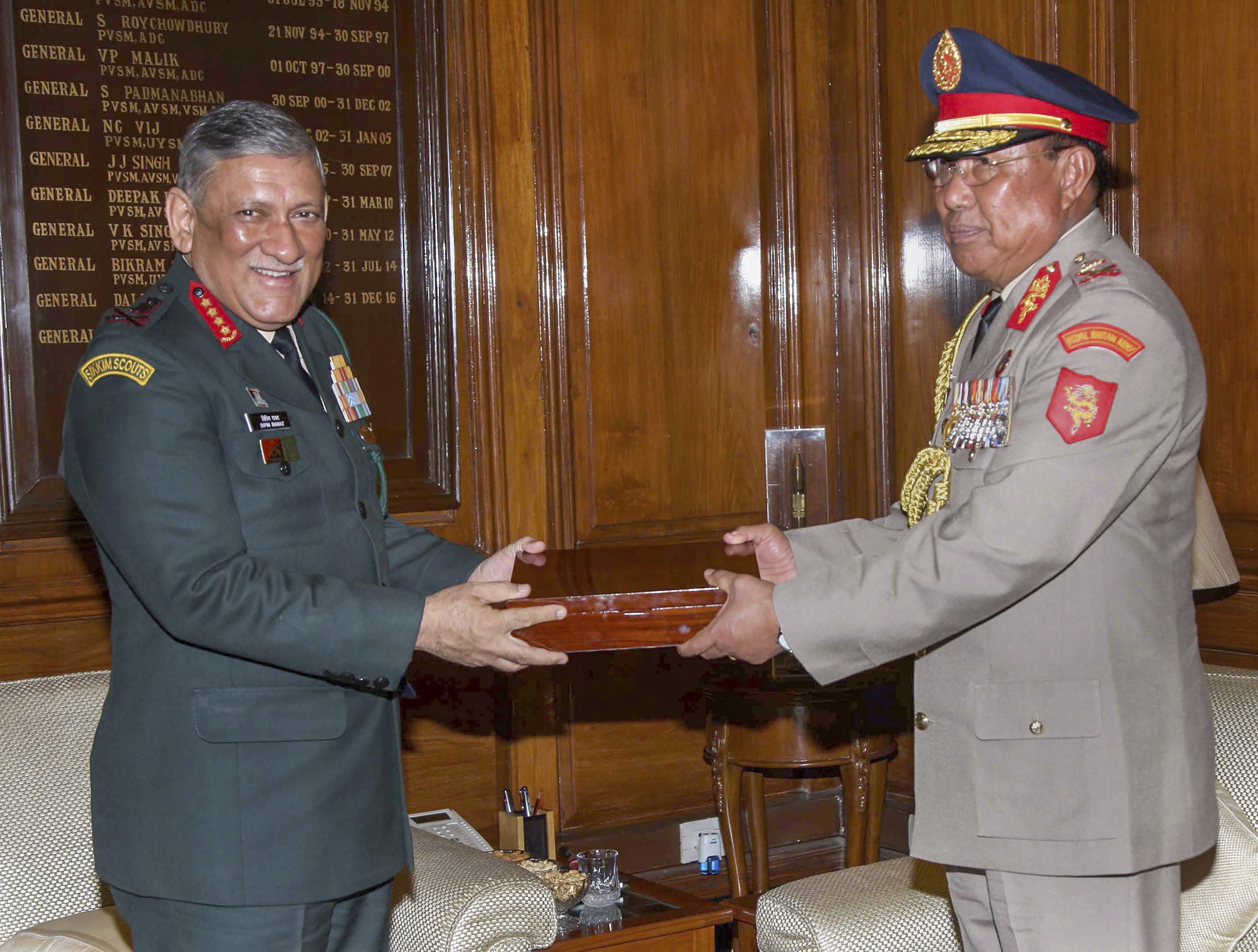 Chief of Army Staff General Bipin Rawat presents a memento to the Chief Operations Officer of Royal Bhutan Army Lt. Gen. Batoo Tshering, at a meeting in New Delhi -  PTI