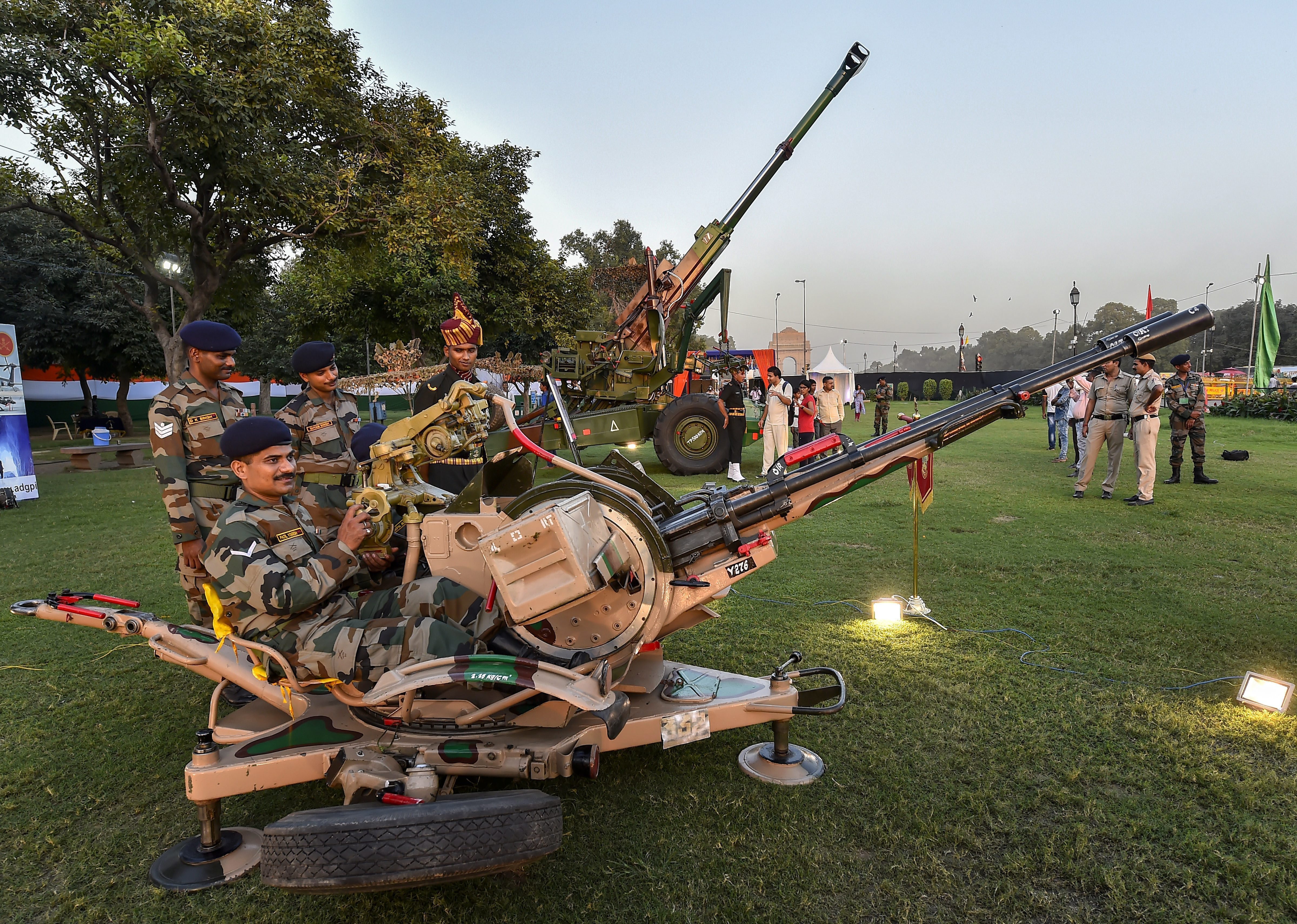 Army personnel pose withan exhibit during the inauguration of 'Parakram Parv', at India Gate Lawns in New Delhi - PTI