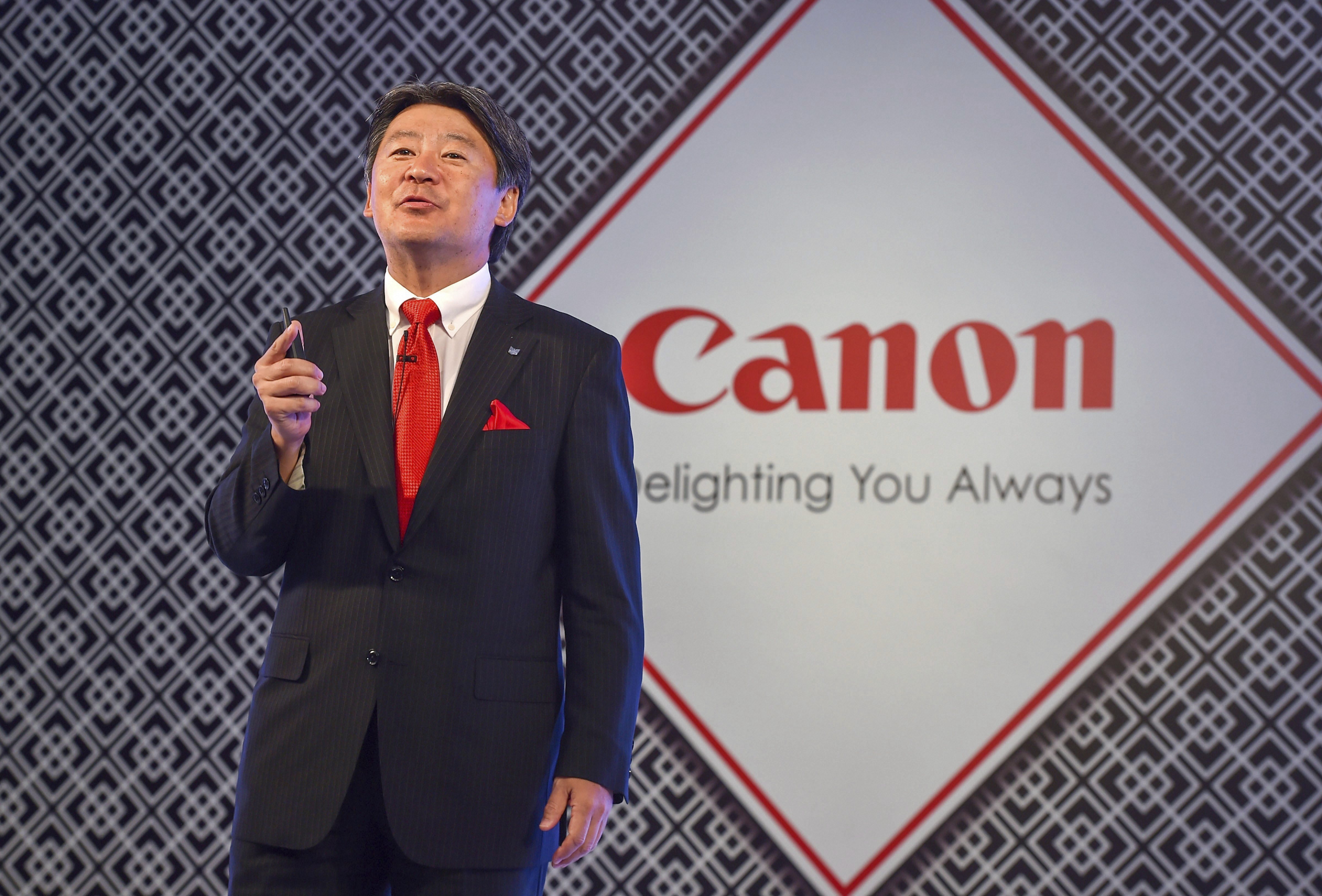 Vice President of Head of Imaging Communication Proucts Group (Canon China, Canon Asia Marketing Group) Toshiyuki (Tiger) Ishii during the launch of Canon's first full frame mirrorless digital camera and a new line up of lenses, at a press conference in New Delhi - PTI