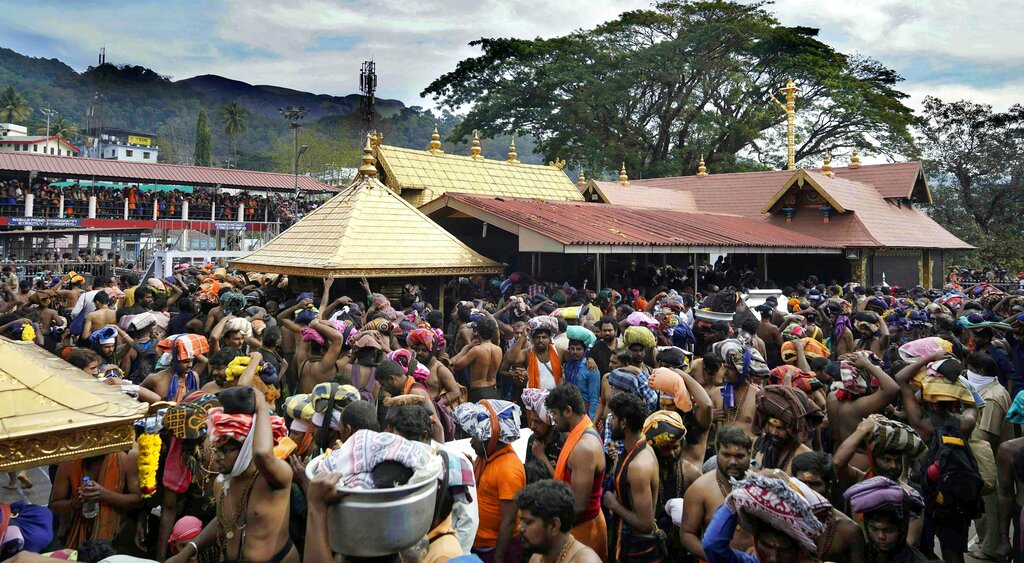 Devotees celebrate Makaravilakku day, in Sabarimala - PTI