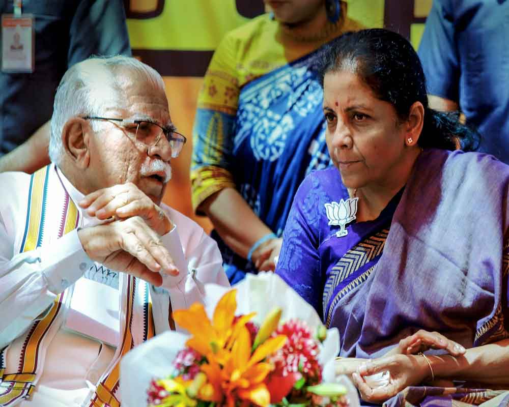 Defence Minister Nirmala Sitharaman and Haryana CM Manohar Lal at BJP Social Media Volunteers meet in Gurugram,- PTI