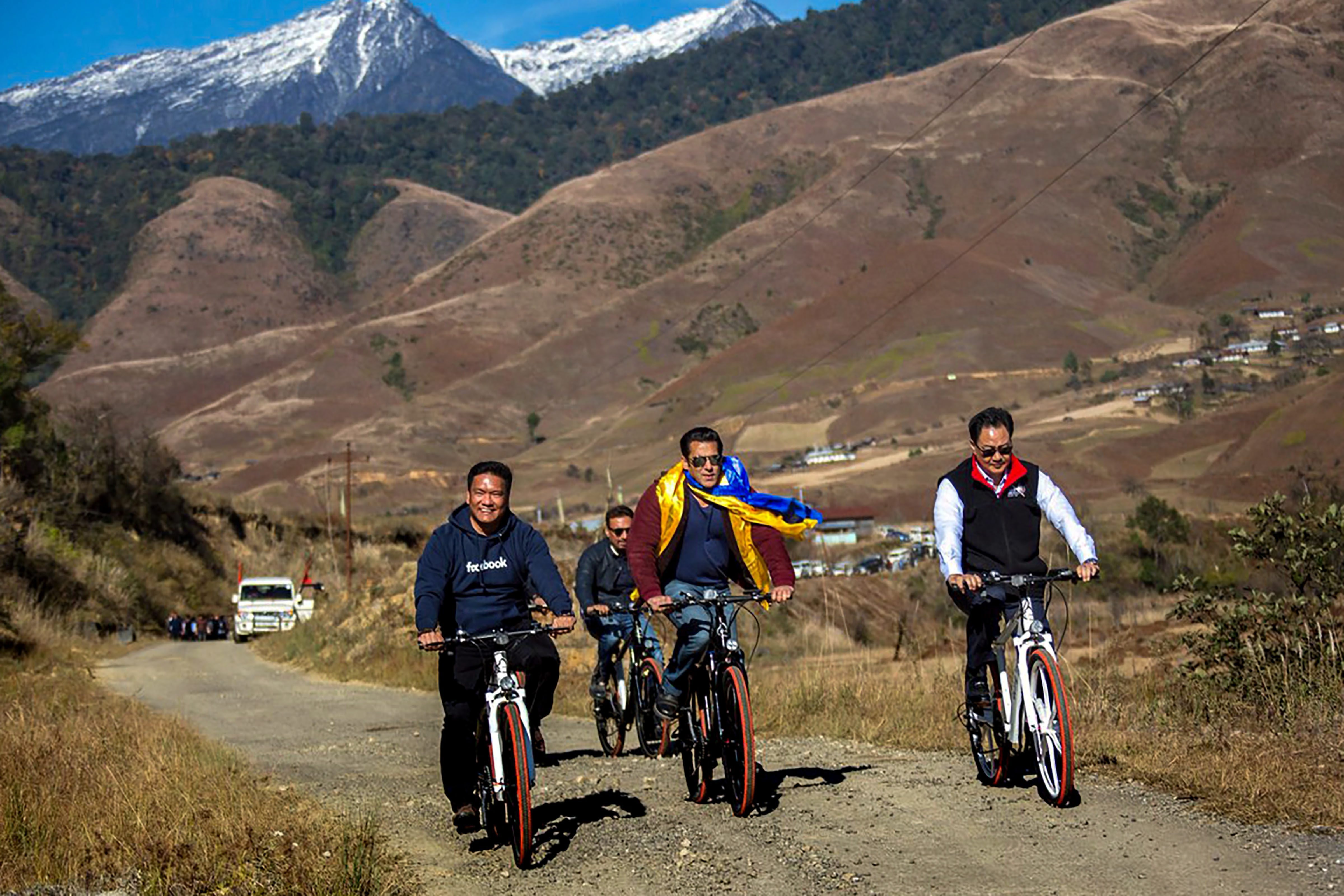 Bollywood actor Salman Khan with Union minister Kiren Rijiju and Arunachal Pradesh Chief Minister Pema Khandu rides bicycles at the conclusion of MTB Arunachal Hornbill's Flight 2018, in Mechuka - PTI