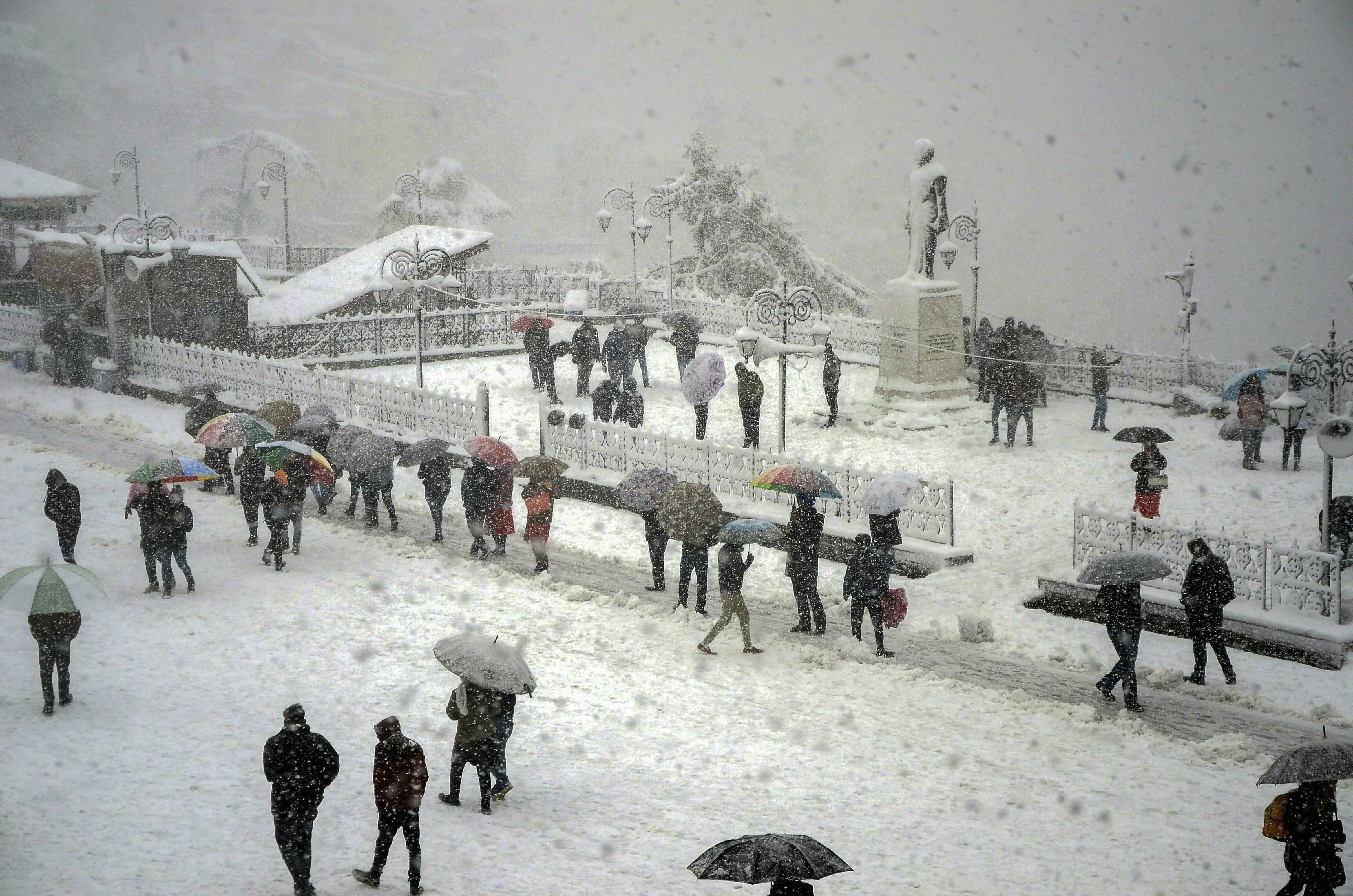 A view of snow-covered city following heavy snowfall in northern hill town of Shimla - PTI