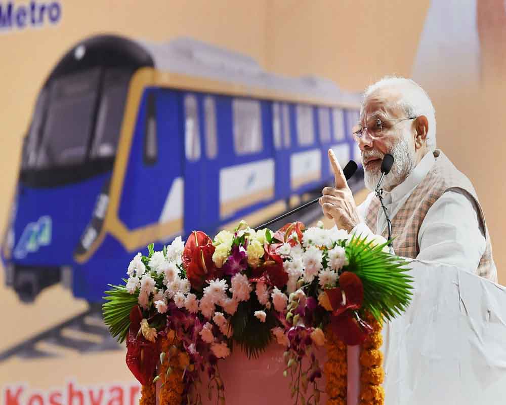 Prime Minister Narendra Modi addresses at the foundation stone laying ceremony of the various Metro Projects, in Mumbai - PTI