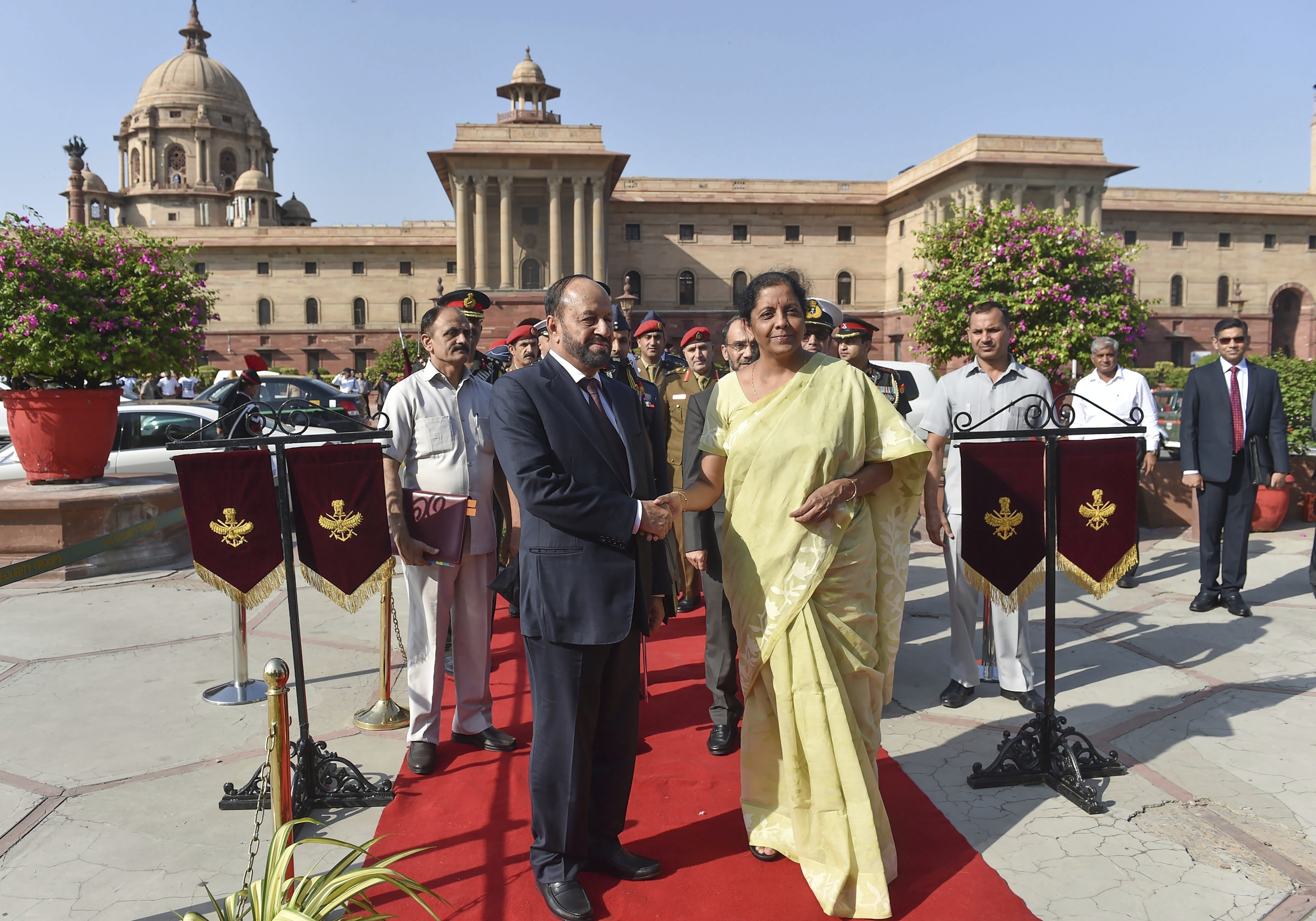 Defence Minister Nirmala Sitharaman shakes hands with Oman's Defence Minister Badr bin Saud al-Busaidi prior to a meeting at South Block in New Delhi - PTI