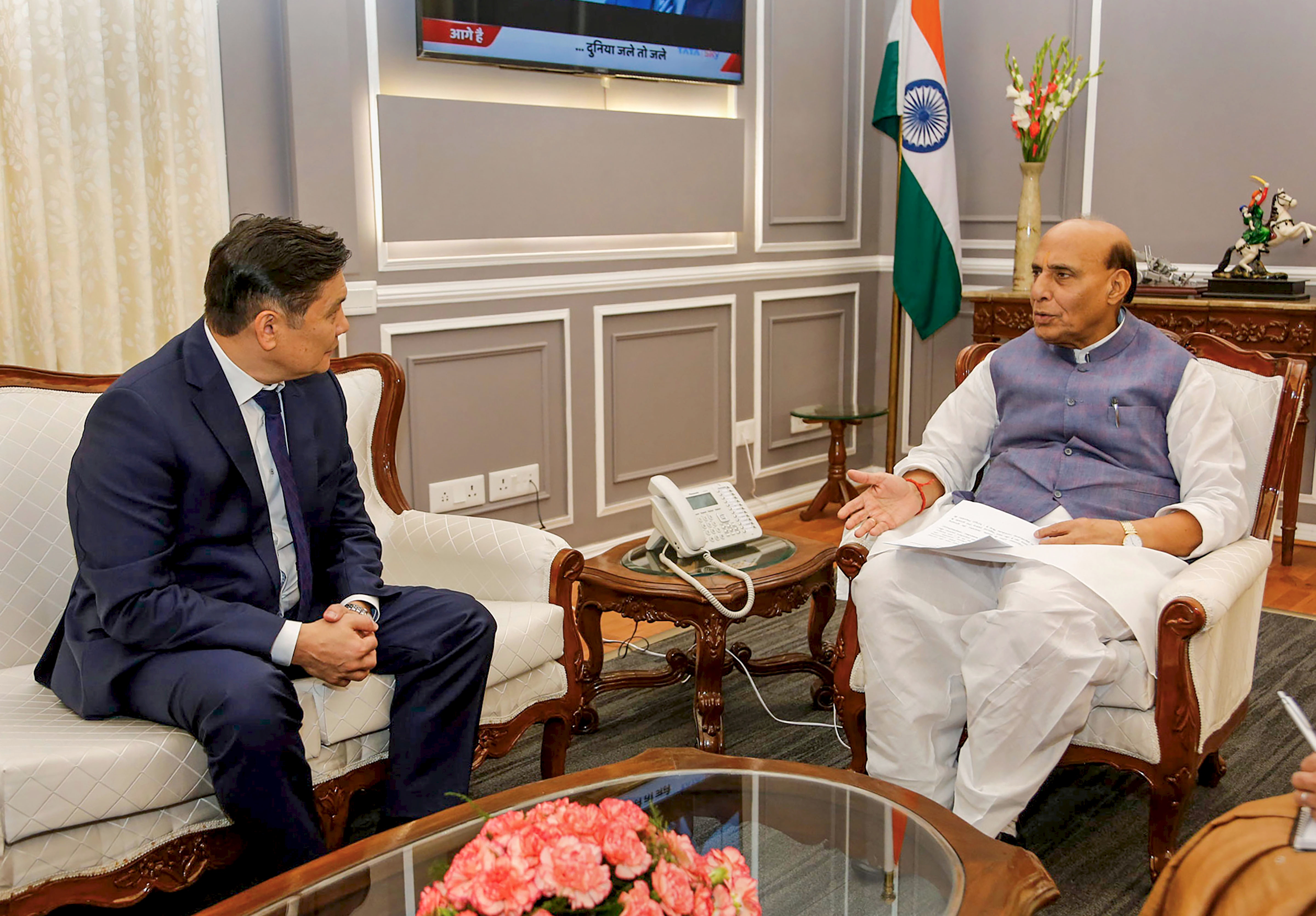 Defence Minister Rajnath Singh and Ambassador-designate of Kyrgyz Republic Asein Isaev during a meeting - PTI