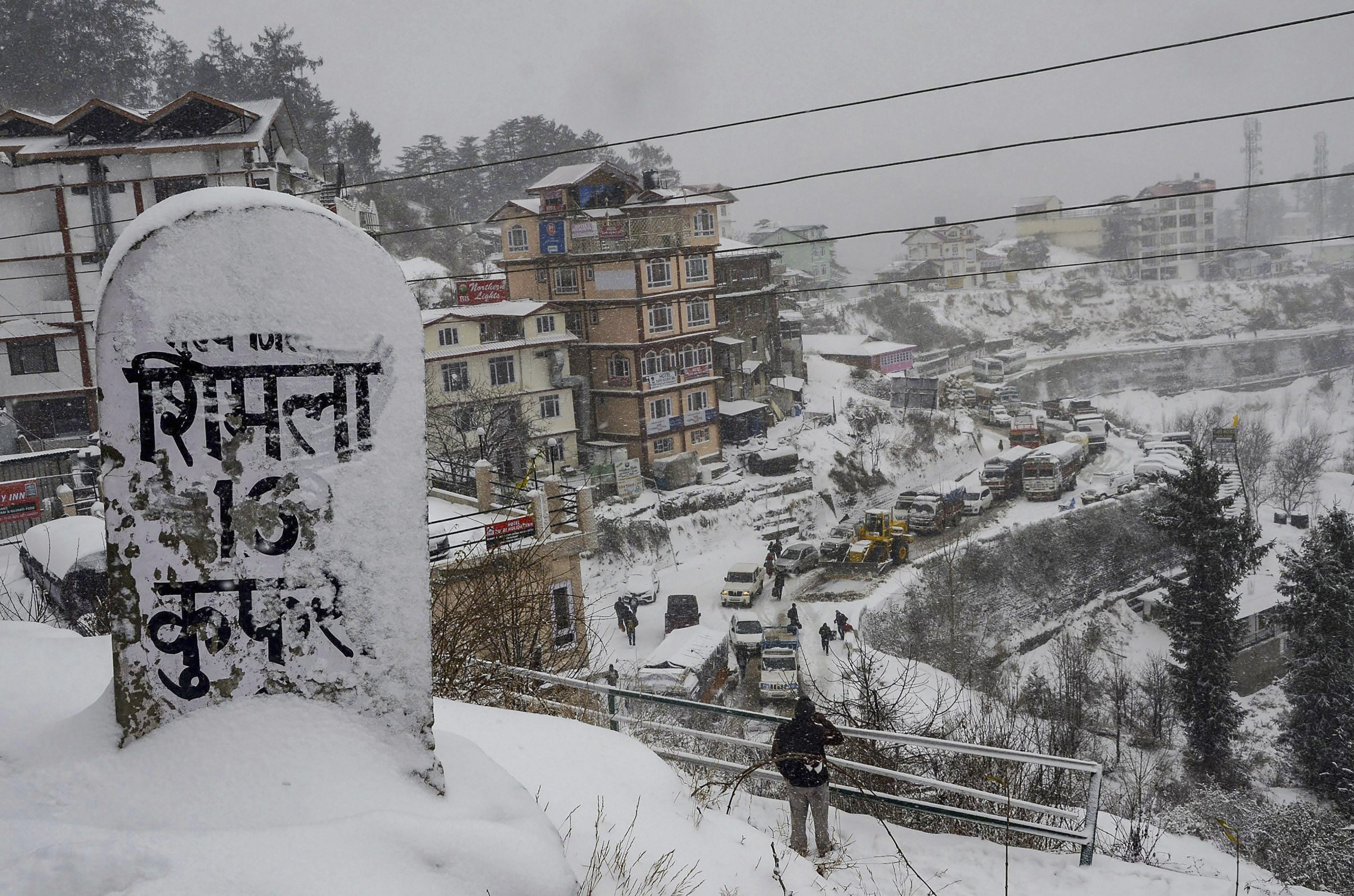 Today's Photo A milestone covered in snow at Kufri