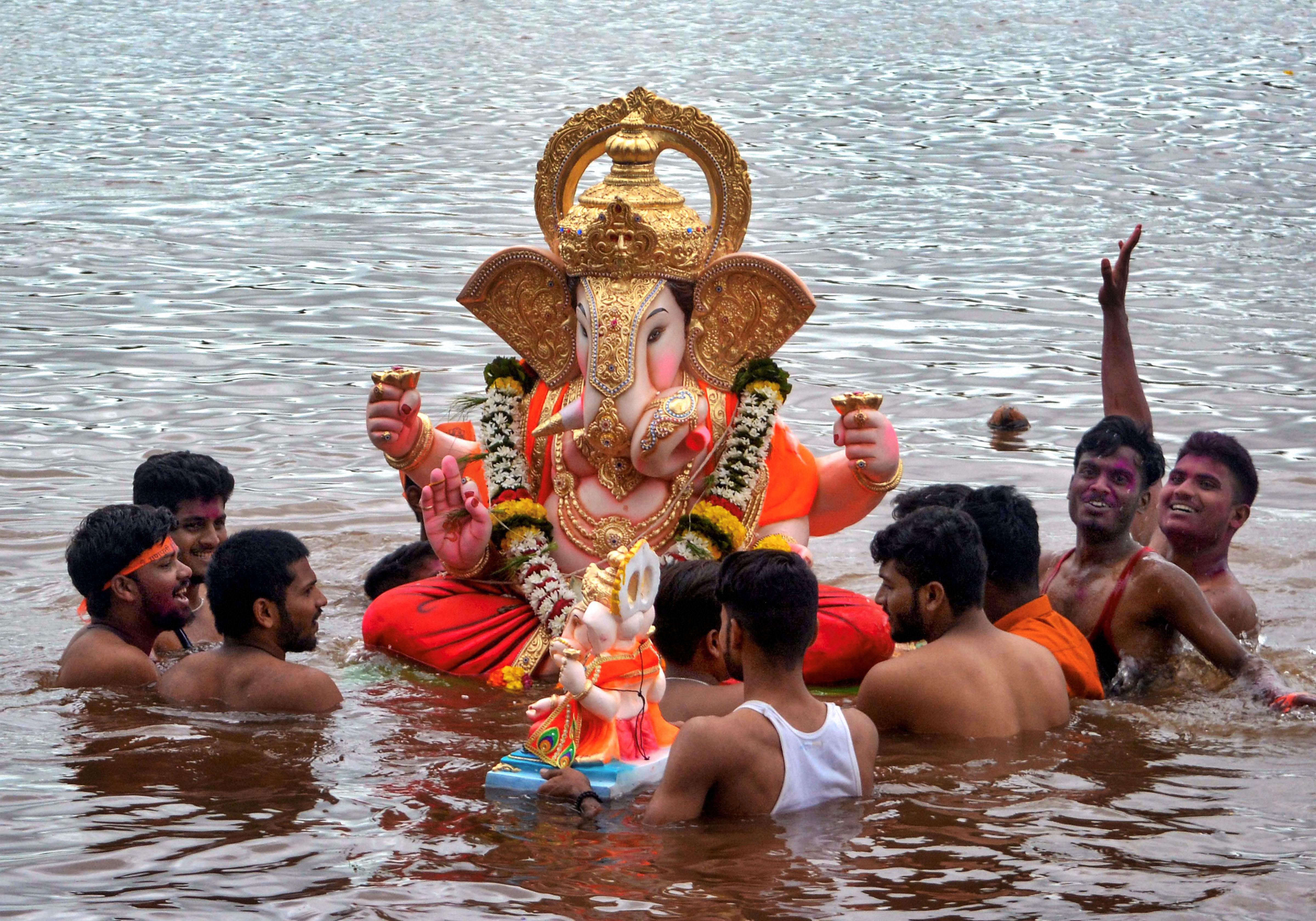 Todays Photo Devotees Immerse A Lord Ganesha Idol During Ganesh Festival Celebrations 2546