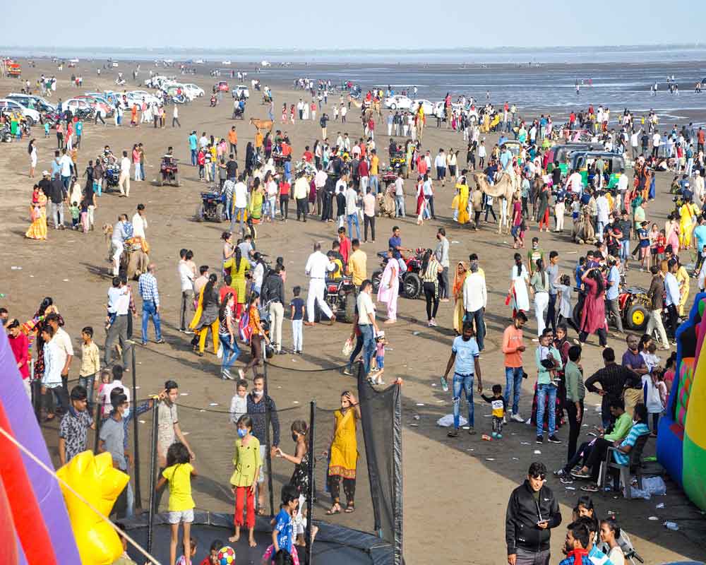 Today's Photo: People gather at Dumas Beach after ease in COVID-19 ...